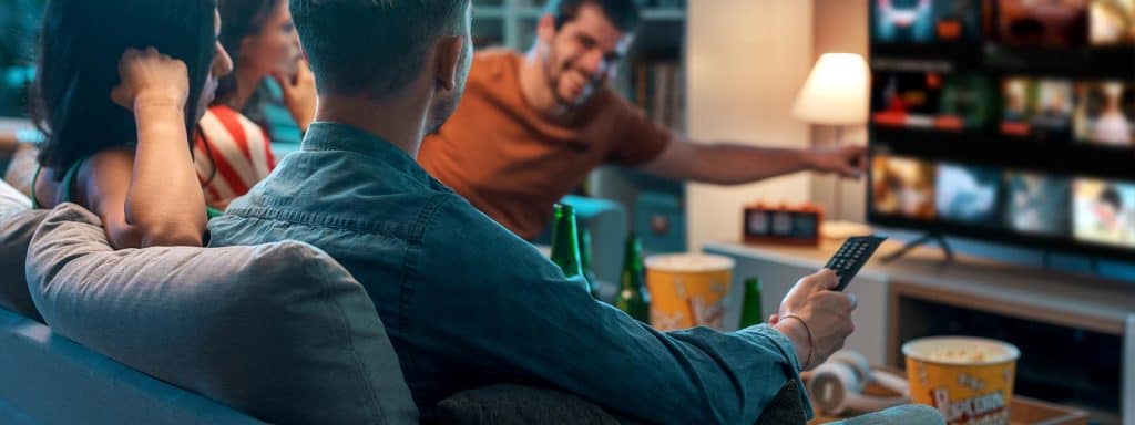 family watching television advertising on a connected TV streaming platform